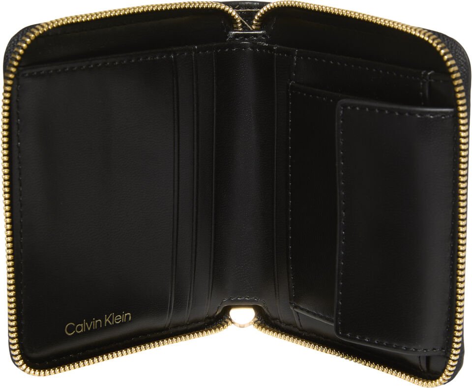 EMBLEM AOP SQUARE ZIP AROUND